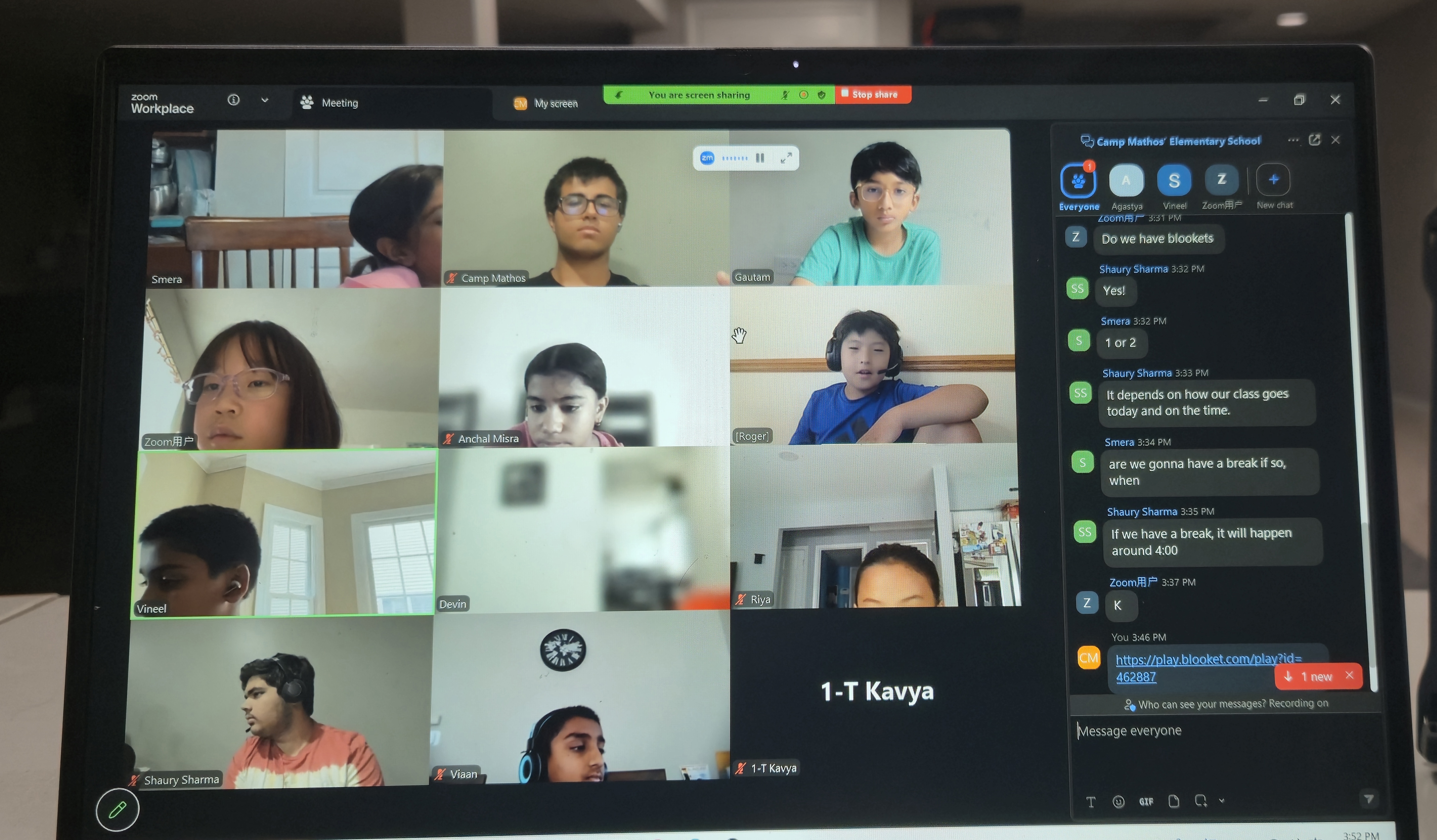 Campers and Camp Directors together during a live Zoom session, with the group chat open alongside the video grid